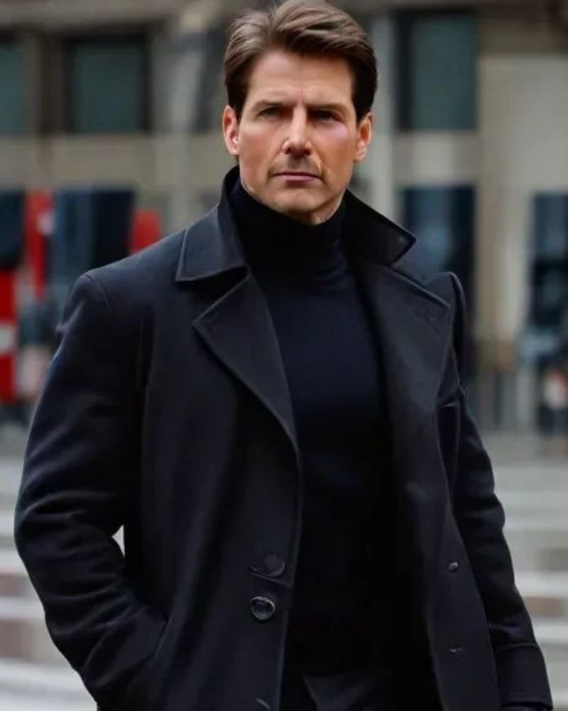 Tom Cruise Mission Impossible 8 Black Coat  Color: Black Material: Wool Fabric Lining: Viscose Lining Front: Buttoned Closure Collar: Lapel Collar Poc